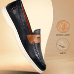 Bugatti Sandiago dark blue leather slip-on shoe with brown accent strap and white sole.
