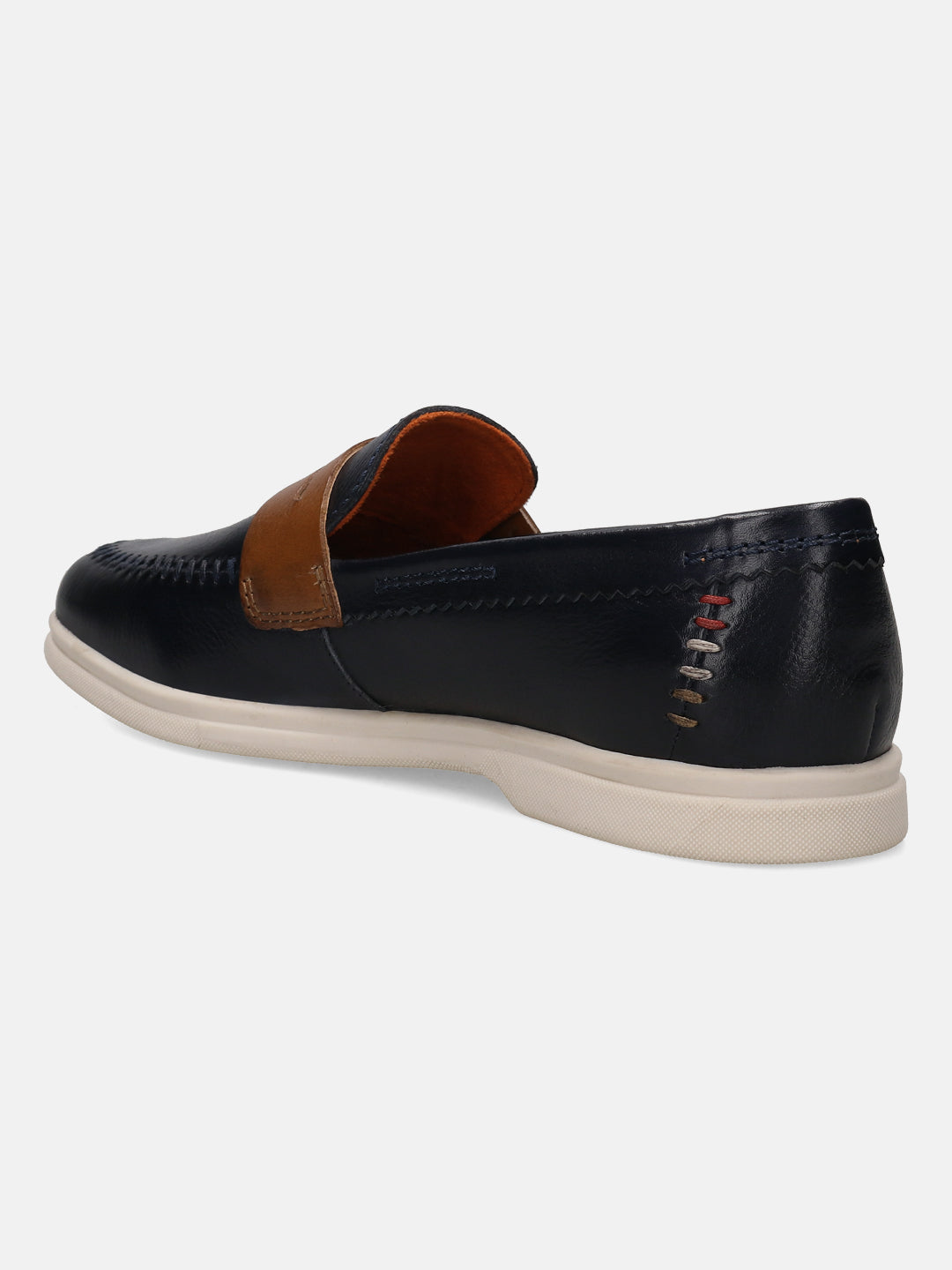 Dark blue leather casual slip-on by Bugatti, showing decorative stitching at the heel, with a light-colored sole.