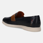 Dark blue leather casual slip-on by Bugatti, showing decorative stitching at the heel, with a light-colored sole.
