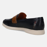Dark blue leather casual slip-on by Bugatti, showing decorative stitching at the heel, with a light-colored sole.