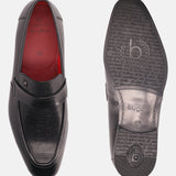 Black leather penny loafers by bugatti with decorative grid-textured panel and imprinted soles.
