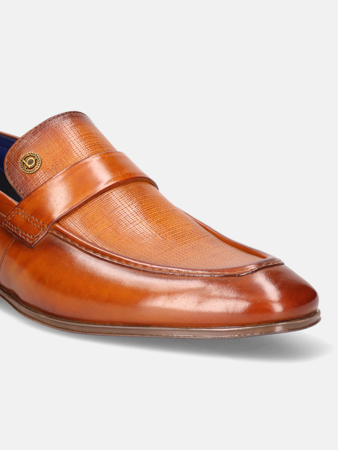 Yellow leather loafer by bugatti, featuring a grid-textured vamp and band with a metallic emblem detail.