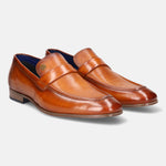 Yellow premium leather penny loafers by bugatti featuring a textured upper and tonal stitching.