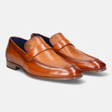 Yellow premium leather penny loafers by bugatti featuring a textured upper and tonal stitching.