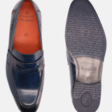Blue leather penny loafers by Bugatti, featuring a burnished finish and debossed text on the sole.