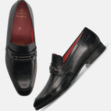 A black Men's bugatti Bit Loafer featuring a round toe apron toe, moulded  heel. Made from premium genuine leather with a durable high quality synthetic outsole, this slip-on design offers both style and comfort.