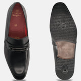 A black Men's bugatti Bit Loafer featuring a round toe apron toe, moulded  heel. Made from premium genuine leather with a durable high quality synthetic outsole, this slip-on design offers both style and comfort.