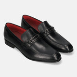 A black Men's bugatti Bit Loafer featuring a round toe apron toe, moulded  heel. Made from premium genuine leather with a durable high quality synthetic outsole, this slip-on design offers both style and comfort.