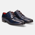 Blue leather derby dress shoes by bugatti with gray laces and red insoles.