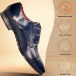 bugatti Margo dress shoe in blue leather with red lining, featuring brogue detailing and a stacked heel.