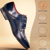 bugatti Margo dress shoe in blue leather with red lining, featuring brogue detailing and a stacked heel.