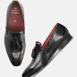A black Men's bugatti Tassel Loafers featuring a round toe plain toe, moulded  heel. Made from premium genuine leather with a durable high quality synthetic outsole, this slip-on design offers both style and comfort.