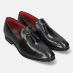 A black Men's bugatti Tassel Loafers featuring a round toe plain toe, moulded  heel. Made from premium genuine leather with a durable high quality synthetic outsole, this slip-on design offers both style and comfort.