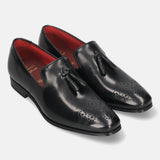 A black Men's bugatti Tassel Loafers featuring a round toe plain toe, moulded  heel. Made from premium genuine leather with a durable high quality synthetic outsole, this slip-on design offers both style and comfort.