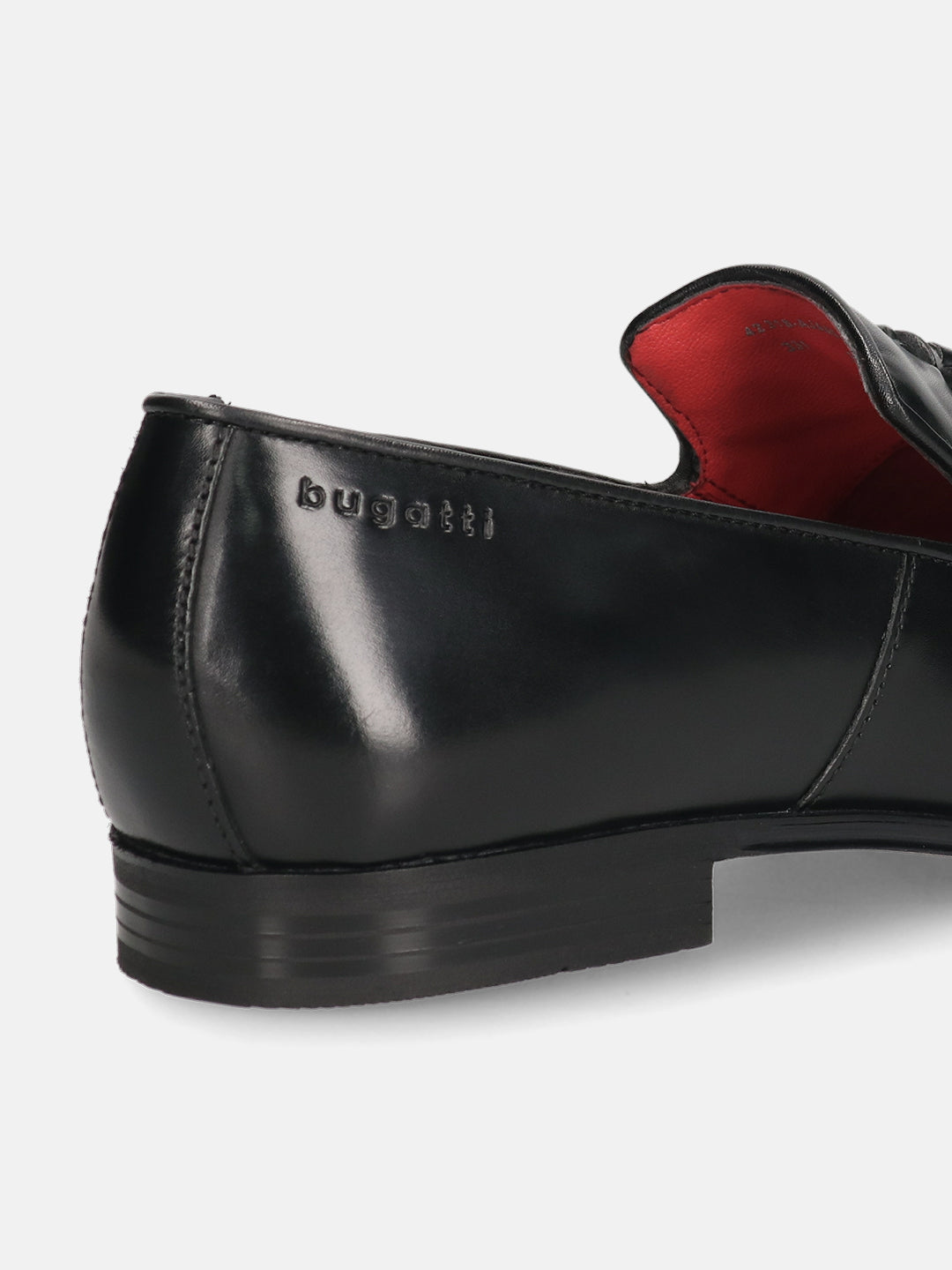 A black Men's bugatti Tassel Loafers featuring a round toe plain toe, moulded  heel. Made from premium genuine leather with a durable high quality synthetic outsole, this slip-on design offers both style and comfort.