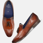 A cognac Men's bugatti Tassel Loafers featuring a round toe plain toe, moulded  heel. Made from premium genuine leather with a durable high quality synthetic outsole, this slip-on design offers both style and comfort.