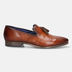 A cognac Men's bugatti Tassel Loafers featuring a round toe plain toe, moulded  heel. Made from premium genuine leather with a durable high quality synthetic outsole, this slip-on design offers both style and comfort.