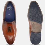 A cognac Men's bugatti Tassel Loafers featuring a round toe plain toe, moulded  heel. Made from premium genuine leather with a durable high quality synthetic outsole, this slip-on design offers both style and comfort.