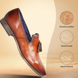 A cognac Men's bugatti Tassel Loafers featuring a round toe plain toe, moulded  heel. Made from premium genuine leather with a durable high quality synthetic outsole, this slip-on design offers both style and comfort.