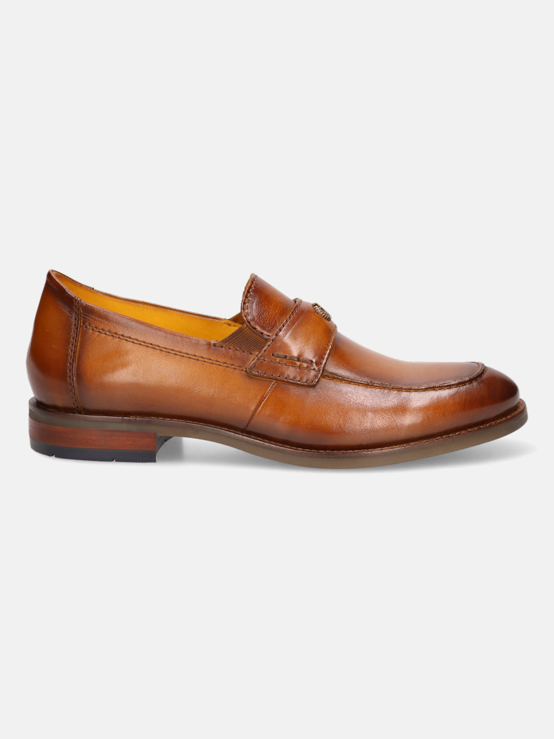 Tan leather penny loafer by bugatti, featuring a slip-on style with a rounded toe and a stacked heel.