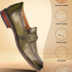 Green leather penny loafers by bugatti, with stacked heel and durable outsole.