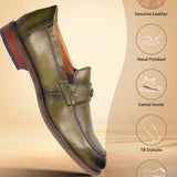Green leather penny loafers by bugatti, with stacked heel and durable outsole.