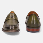 Green premium leather penny loafers by bugatti with a shiny finish and a stacked heel.