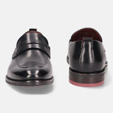 A black Men's bugatti Penny Loafer featuring a round apron toe, moulded  heel. Made from premium genuine leather with a durable tr outsole, this slip-on design offers both style and comfort.