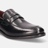 A black Men's bugatti Penny Loafer featuring a round apron toe, moulded  heel. Made from premium genuine leather with a durable tr outsole, this slip-on design offers both style and comfort.