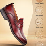 A grey Men's bugatti Penny Loafer featuring a round apron toe, moulded  heel. Made from premium genuine leather with a durable tr outsole, this slip-on design offers both style and comfort.