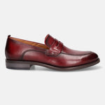 A grey Men's bugatti Penny Loafer featuring a round apron toe, moulded  heel. Made from premium genuine leather with a durable tr outsole, this slip-on design offers both style and comfort.
