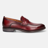 A grey Men's bugatti Penny Loafer featuring a round apron toe, moulded  heel. Made from premium genuine leather with a durable tr outsole, this slip-on design offers both style and comfort.