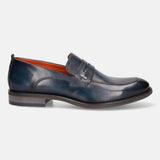 Blue leather penny loafer by bugatti with orange interior and grey heel.