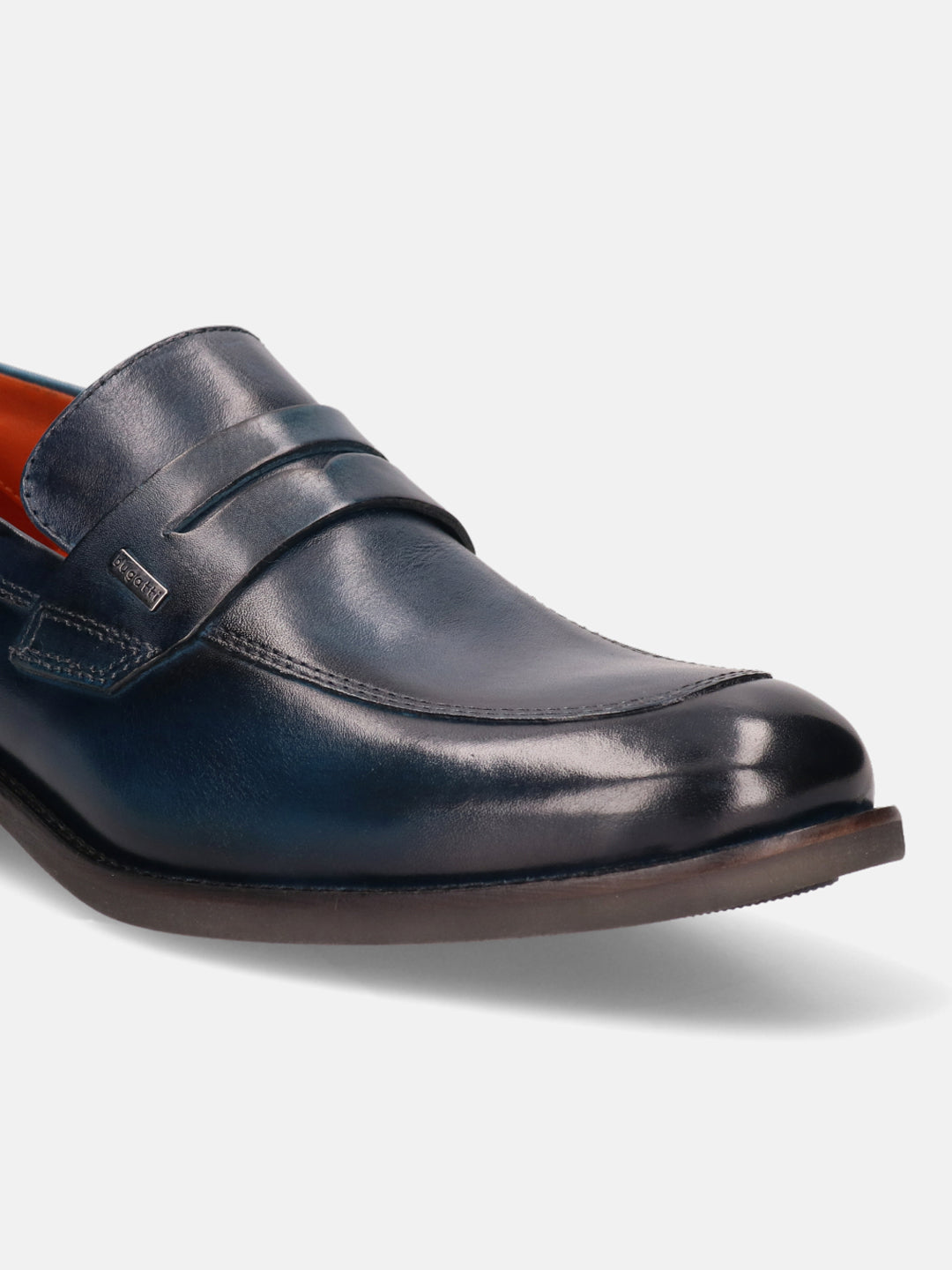 Blue leather penny loafer by Bugatti, with a dark sole and a sleek, modern design.