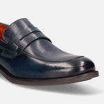 Blue leather penny loafer by Bugatti, with a dark sole and a sleek, modern design.