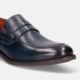 Blue leather penny loafer by Bugatti, with a dark sole and a sleek, modern design.