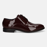Bordeaux dress shoe of premium leather by bugatti featuring black laces and a glossy finish.