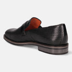 Black leather penny loafer by bugatti with a textured basketweave pattern and a stacked heel.