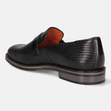 Black leather penny loafer by bugatti with a textured basketweave pattern and a stacked heel.