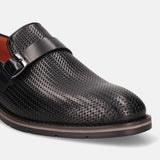 Black leather penny loafer by bugatti, featuring a woven texture and buckle detail.