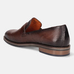 Brown premium leather penny loafer by bugatti, featuring a textured surface and layered sole.