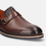 Brown premium leather penny loafer by bugatti, with perforated pattern and buckle detail.
