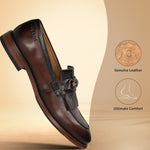 Bugatti Liverta premium leather slip-on shoe in dark brown, shown at an angle, featuring a decorative buckle.