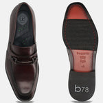 A grey Men's bugatti Bit Loafer featuring a round toe apron toe, stacked heel. Made from premium genuine leather with a durable leather outsole, this slip-on design offers both style and comfort.