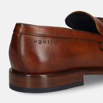 A cognac Men's bugatti Bit Loafer featuring a round toe apron toe, stacked heel. Made from premium genuine leather with a durable leather outsole, this slip-on design offers both style and comfort.