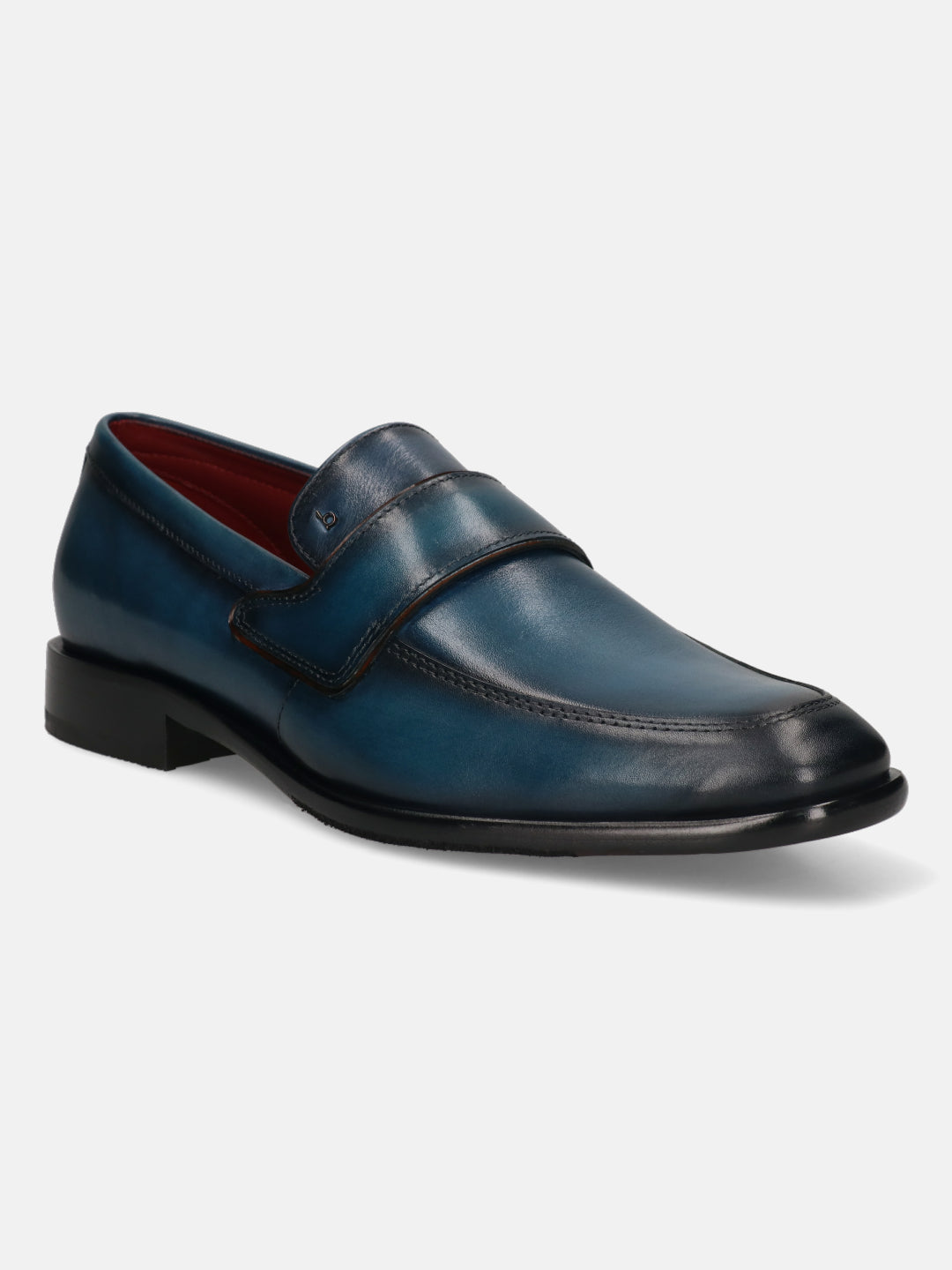 Dark blue leather slip-on dress shoe by bugatti, featuring a cap toe and cushioned insole for added comfort.