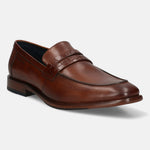 Cognac leather penny loafers by bugatti, featuring a basket weave strap and stitched toe.
