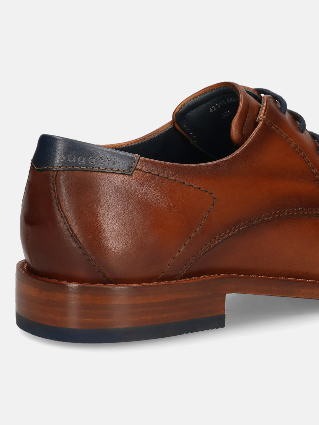 A cognac Men's bugatti Derby featuring a pointed toe plain toe, stacked heel. Made from premium genuine leather with a durable leather outsole, this laces design offers both style and comfort.