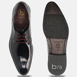 Dark blue leather derby shoes by Bugatti, showing the shoe's sole and interior.