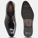 Dark blue leather derby shoes by Bugatti, showing the shoe's sole and interior.